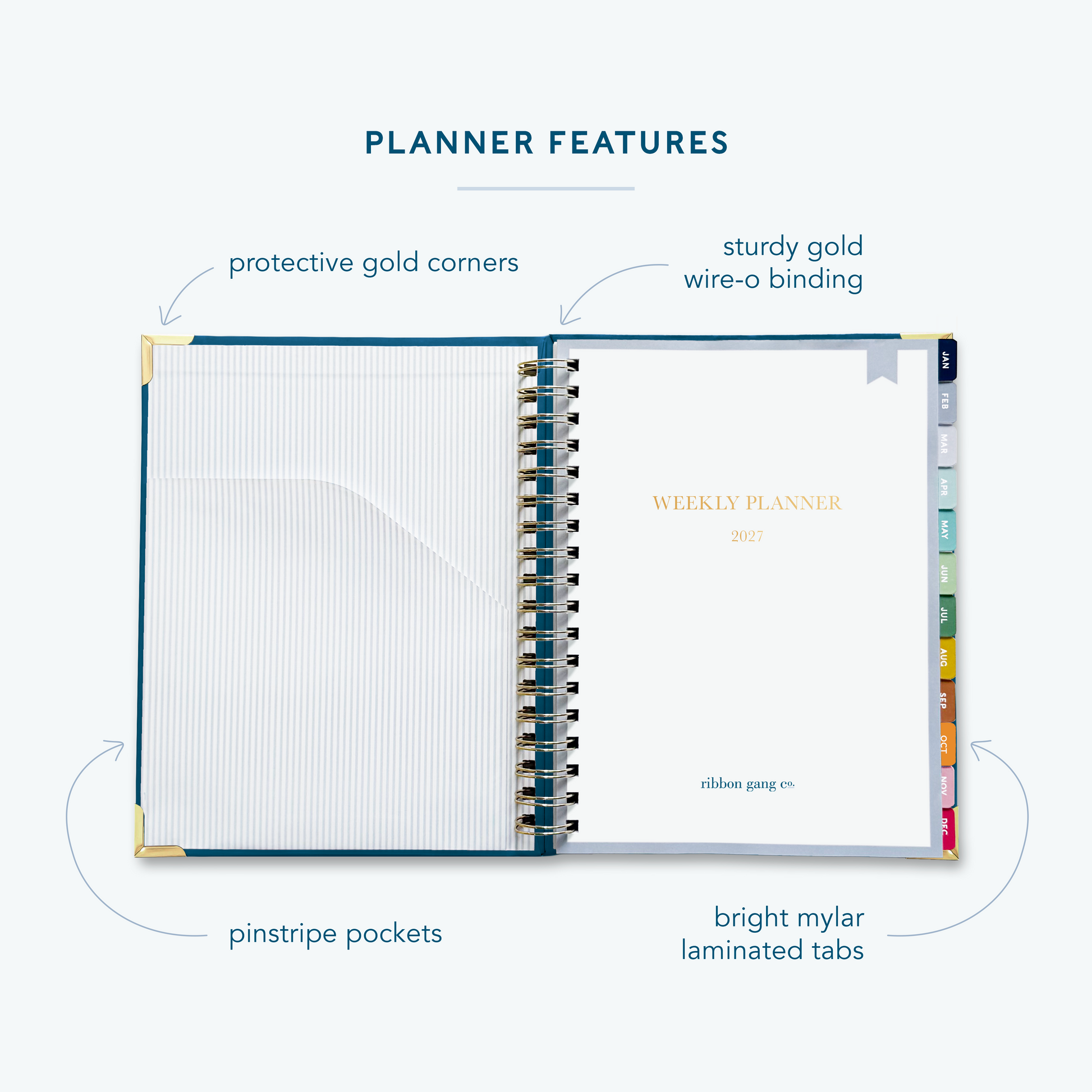 A navy blue spiral bound 2027 planner on a white background open to the first page showing a pocket inside the front cover and a title page.
