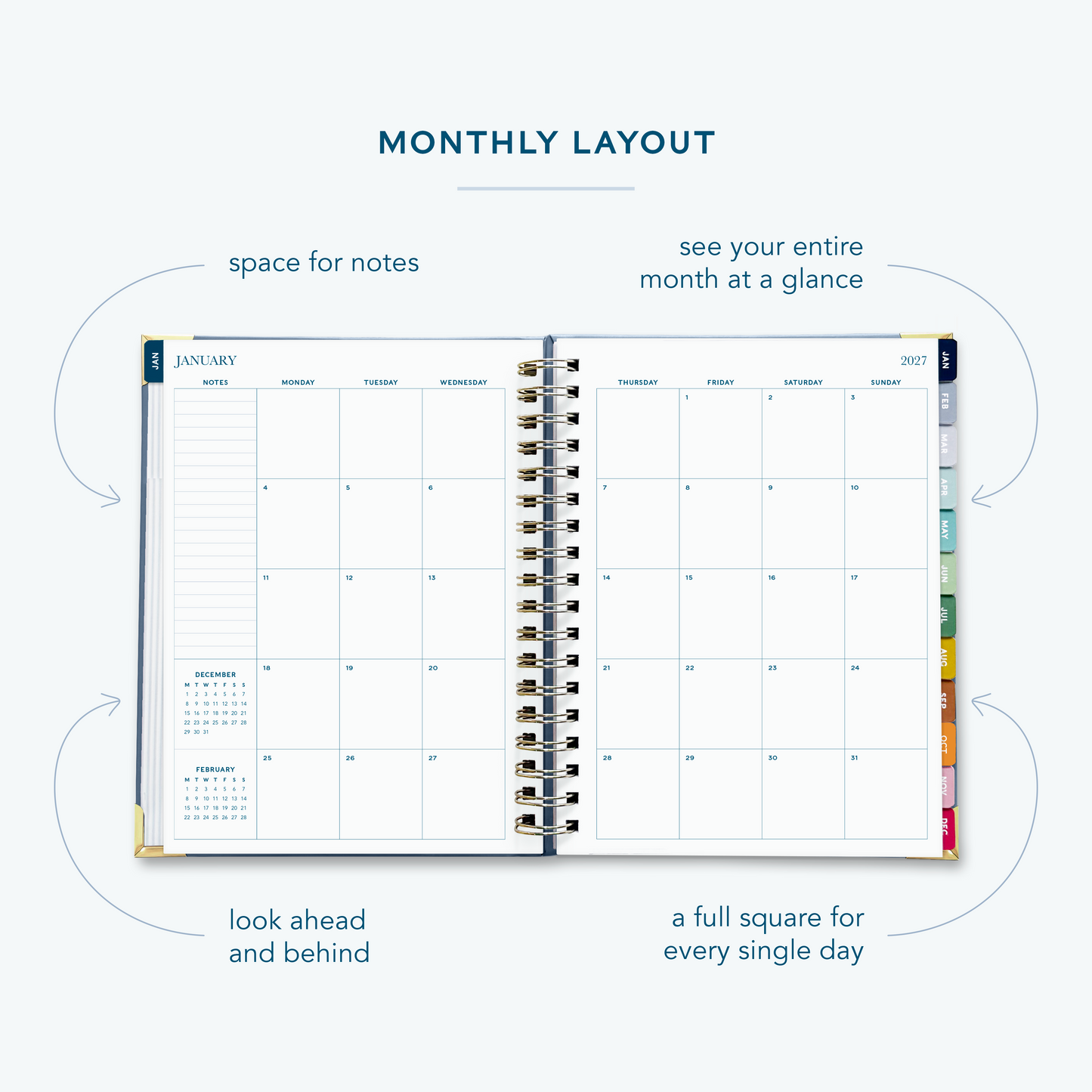 A French blue spiral bound 2027 planner  on a white background open to show the monthly spread over two pages.
