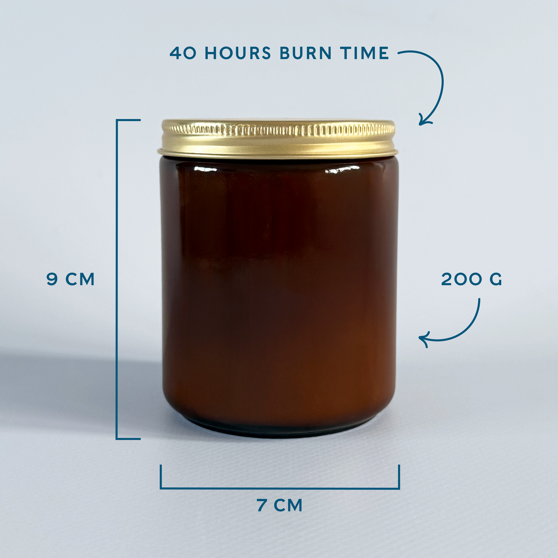 Amber candle jar with gold lid and measurements on a light grey background.